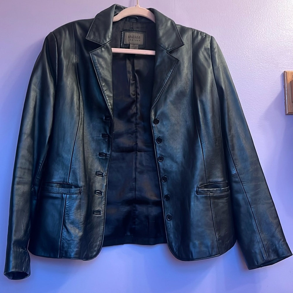 A black Uniform John Paul Richard, women’s leather jacket
